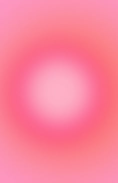 a blurry pink background with an oval shape