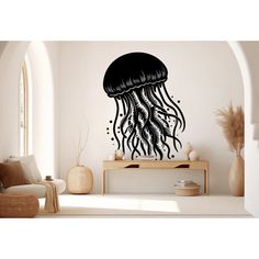 a black and white wall decal with a jellyfish