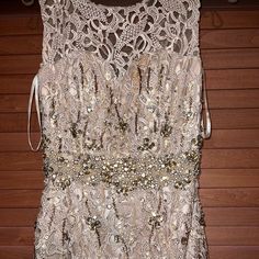 Beaded Lace Gown, Worn Once And In Great Condition. Size 4 Embellished Lace Evening Dress For Prom, Embellished Beige Evening Dress For Formal Occasions, Glamorous Embellished Lace Mother Of The Bride Dress, Beige Embellished Evening Dress For Formal Occasions, Embellished Beige Dresses For Gala, Beige Embellished Dress For Gala, Glamorous Embellished Lace Gown, Embellished Beige Gala Dress, Formal Embellished Beige Evening Dress