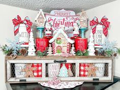 christmas decorations on top of an old dresser