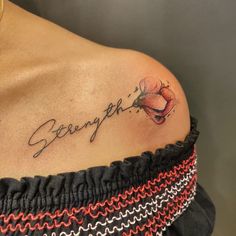 a woman's shoulder with the word strength tattooed on her left arm and an orange flower