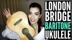 a woman holding a ukulele in front of her face and the words london bridge bartone ukulele