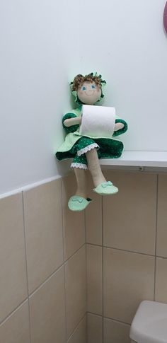 "This handmade textile doll toilet paper holder will decorate your bathroom. It's a special gift for a housewarming, new home, gift for mom, for sister, or as Christmas gift. Materials: The doll is made from 100% cotton.  Towel. Measures approx.: Length: 21\" (53 cm) Width: 8\" (20 cm) The product will be sent beautifully gift-wrapped, ready to be given as a present. There may be slight differences, around the color shades between the product in the image and the actual product. These differences are due to changes in photography or the quality of the computer screen. Every piece is unique, no two items are the same. The paper roll is not included. For more doll toilet paper holders: https://www.etsy.com/shop/NoaZoharHandcrafts?ref=seller-platform-mcnav&section_id=18342265   Thanks for sho Funny Toilet Paper Holder, Sister Christmas Gifts, Stocking Stand, Unique Toilet Paper Holder, Gifts For Mom Christmas, Bathroom Toilet Paper Holders, Christmas Gifts For Sister, Sister Christmas, Cotton Baby Blankets