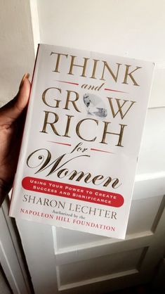 the book think and grow rich for women by sharon lecherer is held up in front of a door