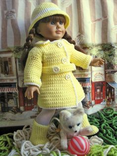 a crocheted doll is standing next to a teddy bear