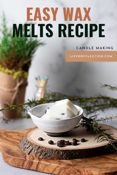 a wooden cutting board topped with a bowl filled with marshmallows