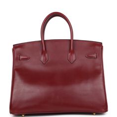 This Birkin is in Rouge H box calf leather with gold hardware and has tonal stitching, two straps with front toggle closure, clochette with lock and two keys and double rolled handles.The interior is lined with Rouge H chevre and has one zip pocket with an Hermes engraved zipper pull and an open pocket on the opposite side.Collection: E CircleOrigin: FranceCondition: Vintage; Excellent to Mint -  This bag retains its shape. There's some of the original plastic on the hardware but missing off some parts. No visible scratching to the exposed hardware. The exterior leather shows some signs of wear with scuffing and scratching to the front and back of bag, near the corners, and near the turnlock plate. The interior leather is clean with no signs of with no signs of use.Accompanied by: Hermes b Hermes Birkin 35, Vintage Hermes, Hermes Birkin, Gold Hardware, Calf Leather, Zip Pockets, Handles, Stitching, Mint