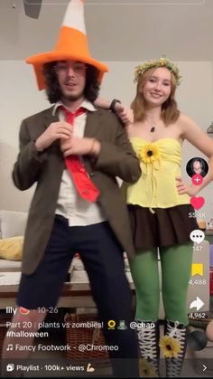 a man and woman dressed up in costumes