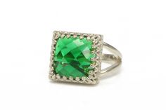 A square ring that flaunts a vivid Emerald stone. This Emerald jewelry ring boasts a lovely and classic design that is truly wearable and giftable for special occasions. Emerald is a May birthstone, perfect gift for a lady born in the month. ☛ 𝒜𝐵𝒞 - Add Engraving - https://etsy.me/2ZSRjhu ☛ Ring size - Select the size you would like from the drop down menu ♥ Gemstone Type - Emerald (Lab Created) ♥ Gemstone Size - 12x12mm ♥ Gemstone Cut - Faceted Square ♥ Metal Type (Main Photo) - 14k Gold Fil Elegant Sterling Silver Square Rings, Rectangular Emerald Ring With Halo Setting, Classic Square Rings For Gifts, Classic Square Rings For Gift, Classic Square Ring For Gifts, Square Rings For Anniversary, Square Cut May Birthstone Rings For Gift, Green Rectangular Diamond Ring For Gift, Green Rectangular Diamond Ring Gift