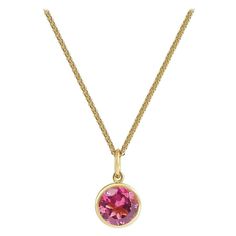 Handcrafted 1.30 Carats Pink Tourmaline 18 Karat Yellow Gold Pendant Necklace. The 7mm natural stone is set in our iconic hand pierced gold lace to let the light through. Our pendants are the ideal gift. Here presented on our finely knitted gold chains. Chain is included in the price, its length is 17 inches adjustable at 16 inches. Pendant measures 8mm diameter. Choose from our selection of precious stones and fine gems to fit ones birthstone or favorite color. Our lace on the reverse allows natural light through its structure revealing the true natural beauty and color of our stones. A hidden diamond on the back rests against your soul. Here presented on our finely knitted gold chain. Chain is included in the price. Tourmalines are considered as the rainbow of gems for their exciting col Hand Piercing, Necklace Indian, Gold Lace, Yellow Gold Pendants, Belleza Natural, Gold Pendant Necklace, Pink Tourmaline, Earings Piercings, Gold Pendant