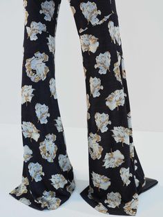 MO&Co. Noir Women's Floral Printed Flared Pants Indulge in comfort and style with our pants. Made with stretchy fabric for maximum comfort, featuring a high-waisted flare design and practical side pockets. The beautiful floral print adds the perfect touch of femininity to your wardrobe. Features : - High waist flared leg, comfy stretchy- Slanted pockets, hook-and-bar closure- Floral printed design Code: MBD1PAT034The back length of size M is 110cmMATERIALS & CARE Material: 94.4% Viscose 5.6% Spa Black Wide Leg Flares For Spring, Black Full Length Flares For Spring, Chic Floral Print Wide-leg Pants, Fall Floral Print Full Length Pants, Floral Print Full-length Pants For Fall, Chic Wide-leg Pants With Floral Print, Chic Wide-leg Floral Print Pants, Chic High-waisted Flares For Summer, Trendy Floral Print Fall Bottoms