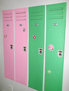 three pink and green lockers with stickers on them are lined up against the wall