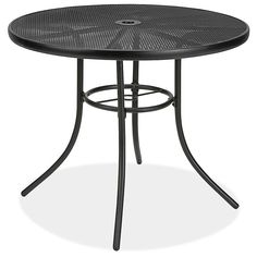 an outdoor table that is black and has a circular design on the top, with metal legs