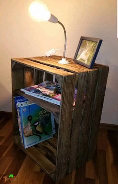 a wooden table with a lamp on top of it