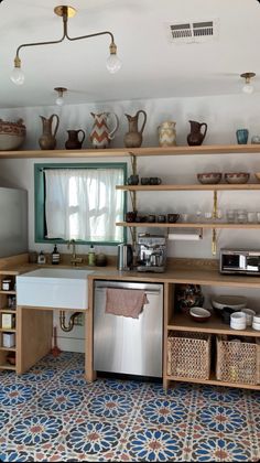 the kitchen is clean and ready to be used for cooking, baking, or eating