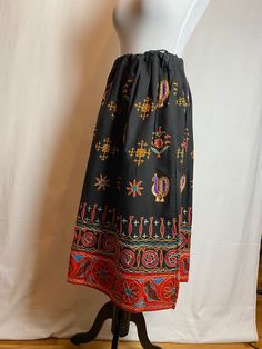 This has a lot of charm! A very black, somewhat heavy cotton peasant style skirt with embroidery all around. Some of which includes little rooster/ chicken figures. It's very vibrant & colorful. In excellent condition. Seems unworn and or very original. Semi structured weighted cotton.  I feel the size is somewhat open, small to a medium. Please check measurements below.  It's in great shape.  ✏️ ✏️✏️DETAILS ✏️✏️✏️ Brand: hand made/ none Size on tag:- Fits like: Small to medium  Color:  black with multicolored embroidery  Material: cotton (embroidery might be wool)  Condition: excellent  Item includes: skirt  ✂ ✂️✂️  MEASUREMENTS ✂️✂️✂️ I measure garments laying flat from seam to seam across, then I double that measurement.  Reach out if you need more information I'm happy to share further Skirt With Embroidery, Embroidered Birds, Birds Design, Peasant Skirt, Embroidered Bird, Embroidery Materials, Peasant Style, Style Skirt, Bird Design