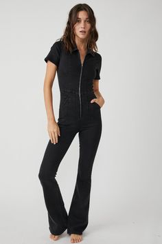 Style No. 79111068; Color Code: 001 Our top-rated Jayde Flares — now in a stunning jumpsuit! The timeless flare silhouette you know & love in a curve-hugging instant outfit. Fit: Slim through the bodice and thigh with flared leg designFeatures: Exaggerated yoking and darting throughout, zip-up closure, collared neckline, vintage-inspired denim wash, stretch denimWhy We <3 It: So flattering with sultry edge, you’ll be reaching for this jumpsuit from season to season. We The Free Heritage inspired and lived-in staples. We The Free is an in-house label. Care/Import Machine Wash Cold Import Measurements for size small Bust: 33 in Waist: 27 in Hips: 33 in Rise: 12 in Inseam: 33 in Sleeve length: 7.5 in Inseam (Short): 31 in Spring Flare Fitted Jumpsuits And Rompers, Fitted Short Sleeve Jumpsuits For Fall, Chic Fitted Denim Jumpsuit With Short Sleeves, Chic Fitted Flare Jumpsuits And Rompers, Fitted Full-length Denim Jumpsuit, Denim Jumpsuit Short, Free People Jumpsuit, Denim Short Jumpsuit, Cropped Graphic Tees