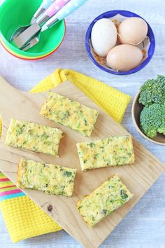 broccoli, eggs and other foods on a cutting board