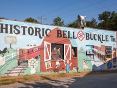 a mural on the side of a building that says historic bellbuckle in front of it