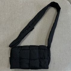 Basically Brand New!!!! Used Once!!! Black Puffer Crossbody Bag Super Fun And Cute Overlapping Design Comes With Small Zipper Pouch Attached Inside Adjustable Strap Super Lightweight And Cute Casual Black Shoulder Bag For Winter, Overlapping Design, Nylon Travel Bag, Grey Crossbody Bag, Small Zipper Pouch, Travel Crossbody, Small Crossbody Purse, Coach Crossbody, Side Bags