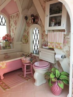 a doll house bathroom with pink furniture and decor on the walls, windows, and tub