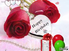 a happy birthday card with roses and balloons