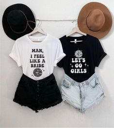 two t - shirts that say man, i feel like a girl and let's go girls