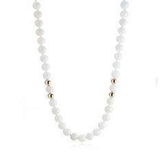 Nine stations of paired gold beads create added interest to this long white jade bead rope necklace. Since 1861, Gump's has been a destination for distinctive jewelry that offers a lifetime of enjoyment. To ensure each piece is created to our exacting standards, our expert in-house jewelry team oversees every step of the production process. The result is a statement of pure elegance. White jade beads, 6mm. 14-karat yellow gold beads, 5mm. 36" long. Elegant Jade Necklaces With Round Beads, Elegant Long Necklace With 8mm Beads, Elegant Jade Beaded Necklace With 8mm Beads, White Pearl Long Necklace With Gemstone Beads, White Hand-strung Rondelle Necklace, Elegant Jade Gemstone Beads, Elegant White Jade Jewelry, Luxury White Necklaces With Polished Beads, Elegant 8mm Rondelle Beaded Necklaces