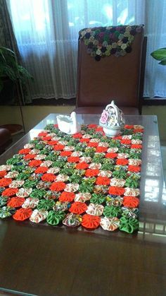 a dining room table with cupcakes on it