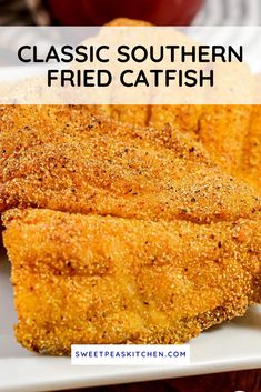 some fried fish on a white plate with an apple in the background and text overlay that reads classic southern fried catfish