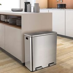 a stainless steel dishwasher in the middle of a kitchen with white cabinets and wood flooring