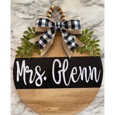 a wooden sign that says mrs glenn on it