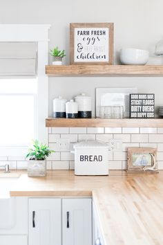 the kitchen counter is clean and ready to be used as a storage area for bread