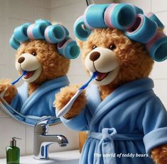 the teddy bear is brushing his teeth in the bathroom mirror while wearing blue robes and holding a toothbrush