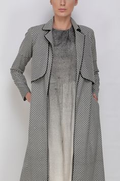 Grey front-open jacket with hounstooth print, contrast piping and side pockets.
Component: 1
Printed
Neckine: Notched Lapel
Sleeve Length: Full
Fabric: Handwoven Noil Silk, Cotton
Color: Grey
Note: Dress worn by the model is not for sale - Aza Fashions Fall Blazer With Contrast Trim And Long Sleeves, Office Outerwear With Contrast Trim For Fall, Fall Office Outerwear With Contrast Trim, Tailored Long Sleeve Outerwear With Houndstooth Pattern, Tailored Outerwear With Contrast Trim For Fall, Tailored Houndstooth Long Sleeve Outerwear, Workwear Outerwear With Contrast Trim And Lapel Collar, Fitted Spring Outerwear With Contrast Trim, Fitted Outerwear With Contrast Trim For Fall