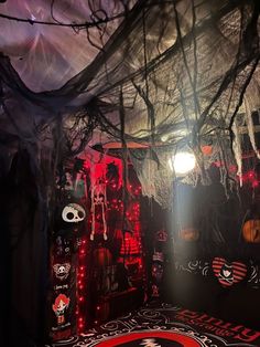 the interior of a halloween themed room with lights and decorations