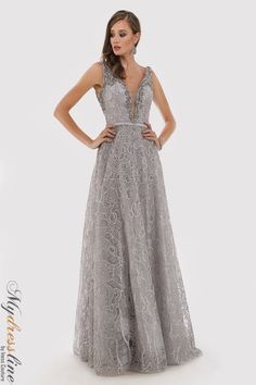 Looking for an elegant evening dress that will make you stand out? Look no further than the Lara 29776. This luxurious gown features a beautiful design with intricate details that are sure to turn heads. Made from high-quality materials, this dress is sure to make you feel confident and stylish at your next formal event. Mother Of The Bride Looks, Lace Ball Gowns, Perfect Prom Dress, Beaded Gown, Quality Dresses, A Line Gown, Dress Silhouette, Lace Gown, Long Gown