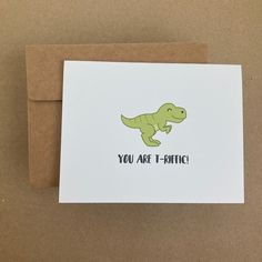 a greeting card with an image of a t - shirt dinosaur that says, you are i triffic