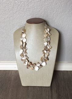 Fun and Flirty for Summer! 16 Inch Necklace with a 4 inch silver extender chain and silver lobster clasp. Tons of slightly unique mother of pearl beads (naturally occurring) that have a shimmer to them. Thank you for supporting American small business! Hate to wait? Me too! I ship 6 days a week. 16 Inch Necklace, Chunky Statement Necklace, Summer 16, Jewelry White, Coral Jewelry, Beaded Statement Necklace, Orange And Turquoise, White Necklace, Shell Necklace