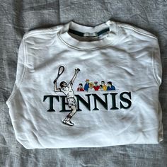 Never Worn Spring Tennis Crew Neck Top, Cotton Tennis Sweatshirt In Relaxed Fit, Cotton Tennis Sweatshirt With Relaxed Fit, Spring Crew Neck Tennis Tops, Spring Tennis Tops With Crew Neck, Cotton Crew Neck Tennis Sweatshirt, Cotton Crew Neck Sweatshirt For Tennis, Casual Cotton Tennis Tops, Long Sleeve Graphic Print Tops For Tennis