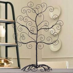 a wire tree is sitting on a table