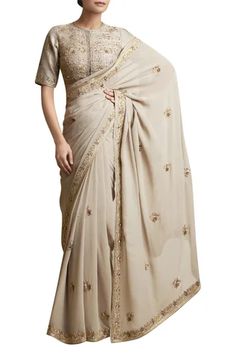 Spruce up your saree wardrobe with this stunning saree in sage green palette.
Metallic embroidered border
Set of 2
Comes with a blouse
Round neckline and short sleeves - Aza Fashions Metallic Embroidery, Indian Designer Sarees, Green Saree, Latest Sarees, Chaniya Choli, Blouse For Women, Embroidery Blouse, Blouse Online, Green Blouse