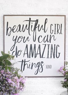 a sign that says beautiful girl you can go amazing things xoxo on it