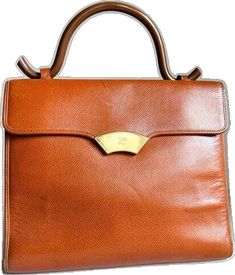 Luxury Caramel Bag For Formal Occasions, Retro Crossbody Shoulder Bag For Formal Occasions, Retro Top Handle Bag With Leather Lining, Vintage Formal Crossbody Satchel, Elegant Vintage Brown Top Handle Shoulder Bag, Retro Cognac Satchel Bag, Vintage Crossbody Satchel For Formal Occasions, Retro Brown Shoulder Bag With Top Handle, Retro Business Shoulder Bag With Detachable Handle