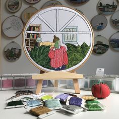 there is a embroidery project on the table