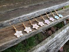 These cute little Sakura flower (cherry blossom) earrings would make a great gift. You can choose your color: white, pink, lavender, or turquoise. The flowers measure 1/2 inch wide. The hooks are nickel-free. This would make a great gift for a bridesmaid or a birthday, an anniversary or Christmas. All jewelry items come in a gift box. Follow this link for a matching necklace... https://www.etsy.com/listing/758932422/sakura-necklace-cherry-blossom-necklace?ref=listings_manager_grid Cute Flower Earrings For Mother's Day Gift, Cute Flower-shaped Earrings For Wedding, Cute Flower Earrings For Wedding, Cute Flower Earrings For Gift, Cute Flower Earrings As Gift, Cute 3d Flower Earrings For Gift, Cute 3d Flower Earrings Gift, Sakura Necklace, Flower Cherry Blossom