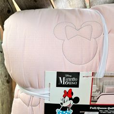 the minnie mouse pillow is on display for sale