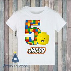 a white shirt with the number five in lego blocks