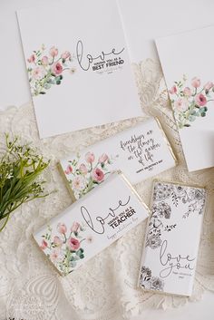 wedding stationery with pink flowers and calligraphy