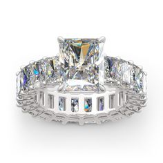 a princess cut diamond ring set with baguetts